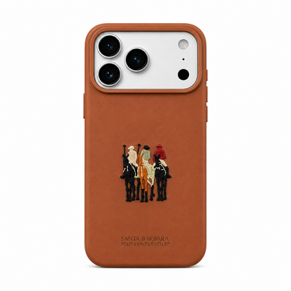 Tan leather iPhone 17 case with 3D embroidered polo rider design, back view